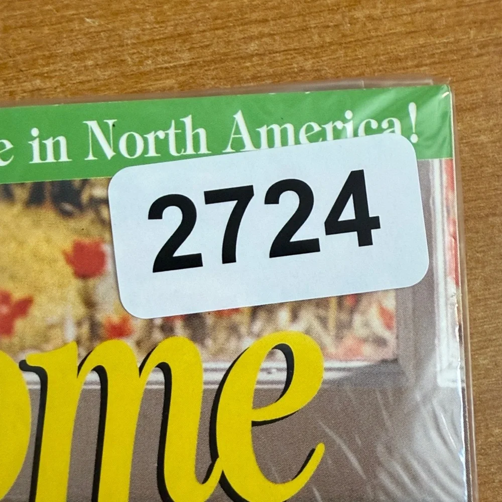 Taste of Home Cookbook with Green and Yellow Highlights‎